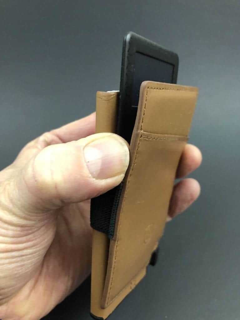 Ekster with card between pocket and cardholder