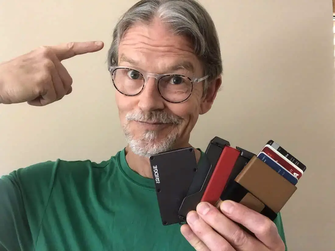 Kim holding 3 smart wallets