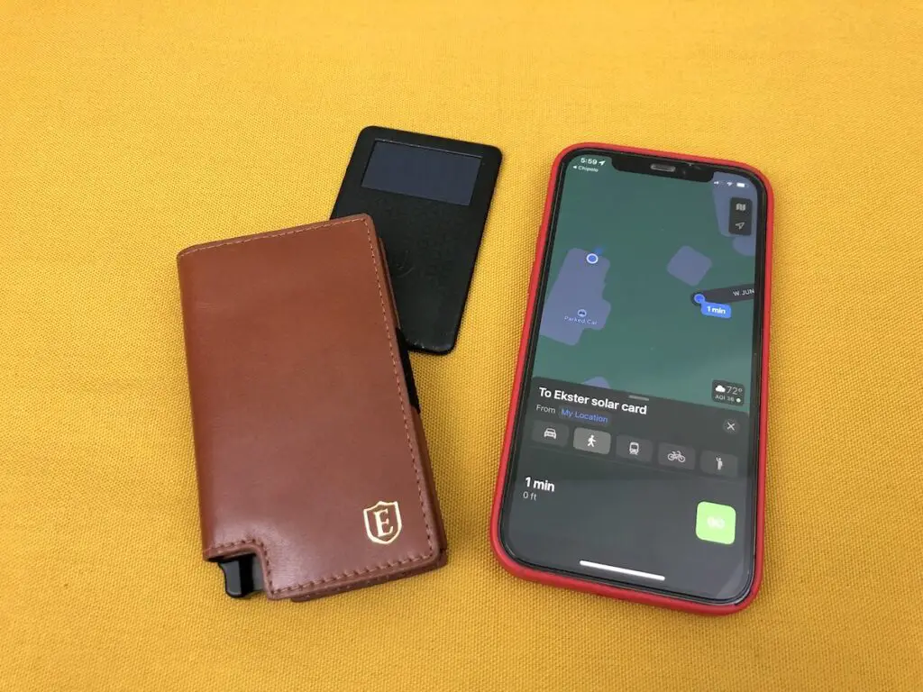 Ekster solar card with Parliament wallet and phone with Chipolo find screen